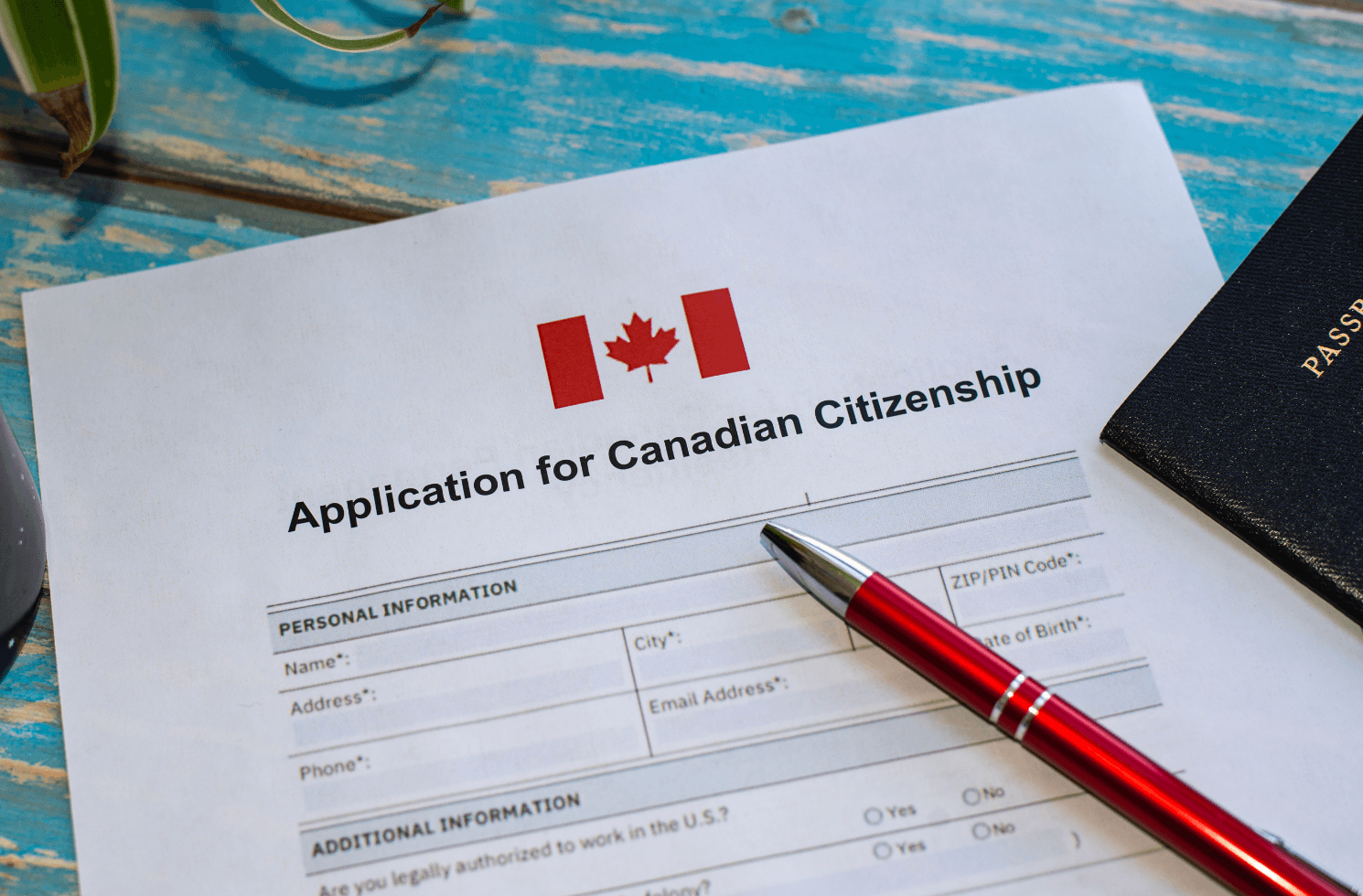 Application for Canadian citizenship with pen on top